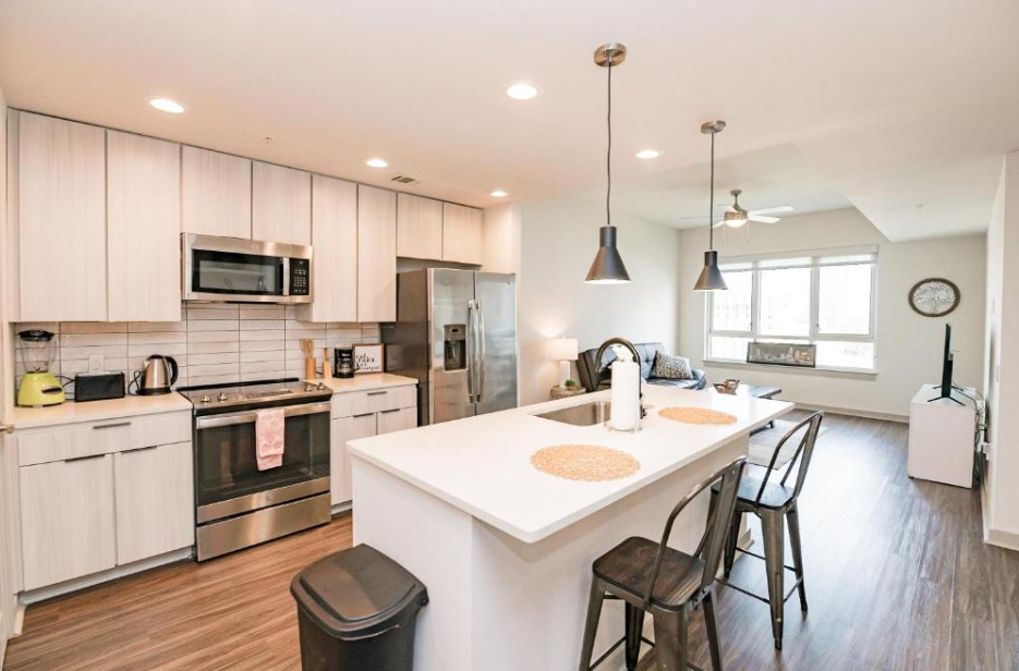 Modern kitchen in a family-friendly furnished apartment with full amenities